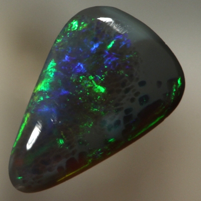 SOLID BLACK OPAL Bright fire. Green rolling flashes
